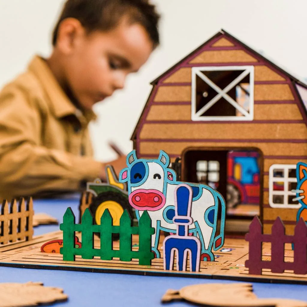 Dreng leger med bondegård