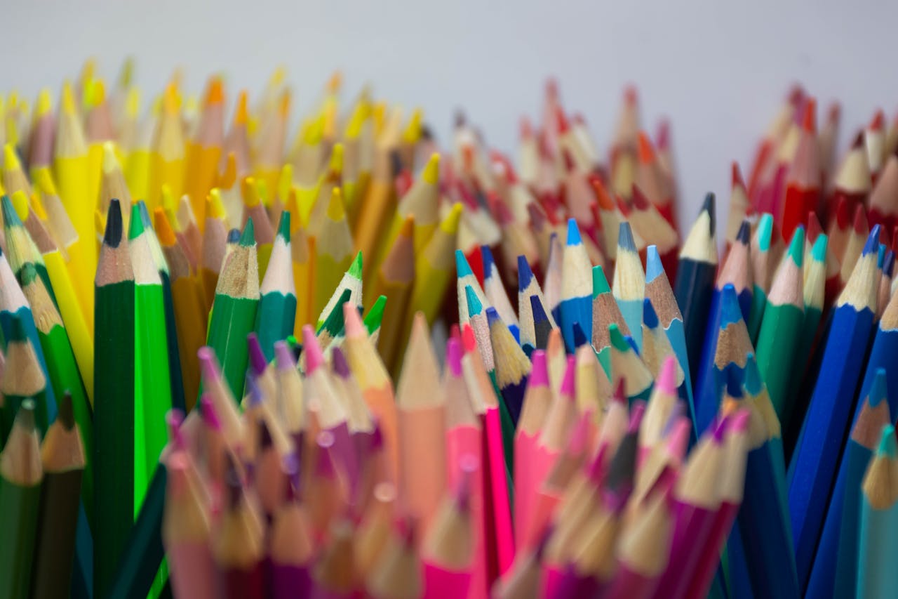 A colorful close-up of sharpened colored pencils in a vibrant assortment.