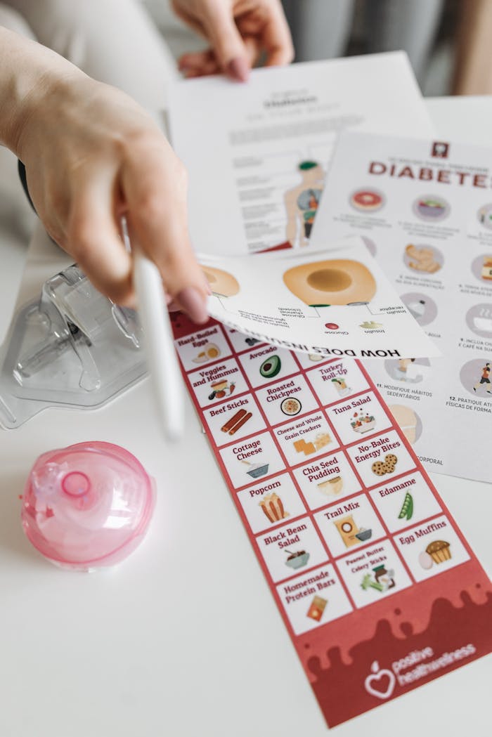 services-04 Informative diabetes pamphlets and dietary guide with hand interaction.